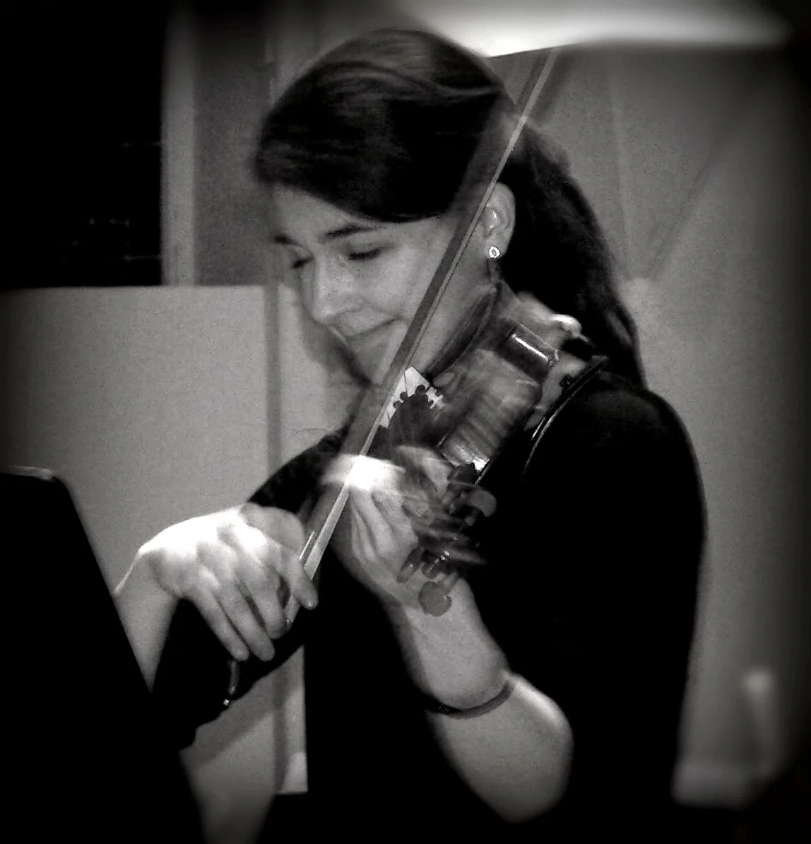 Instructor playing the violin
